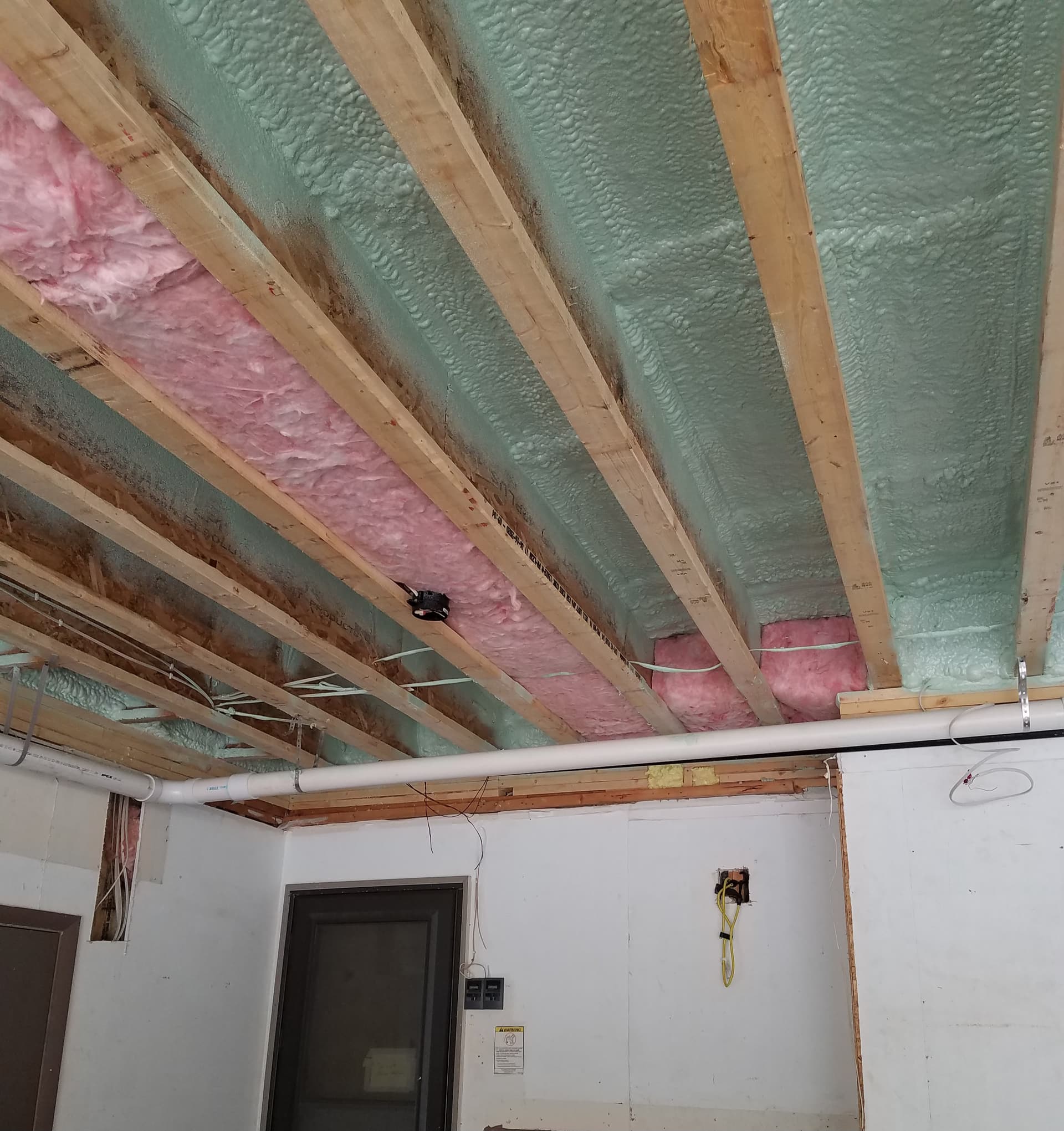Fiberglass batt insulation installed in a wall
